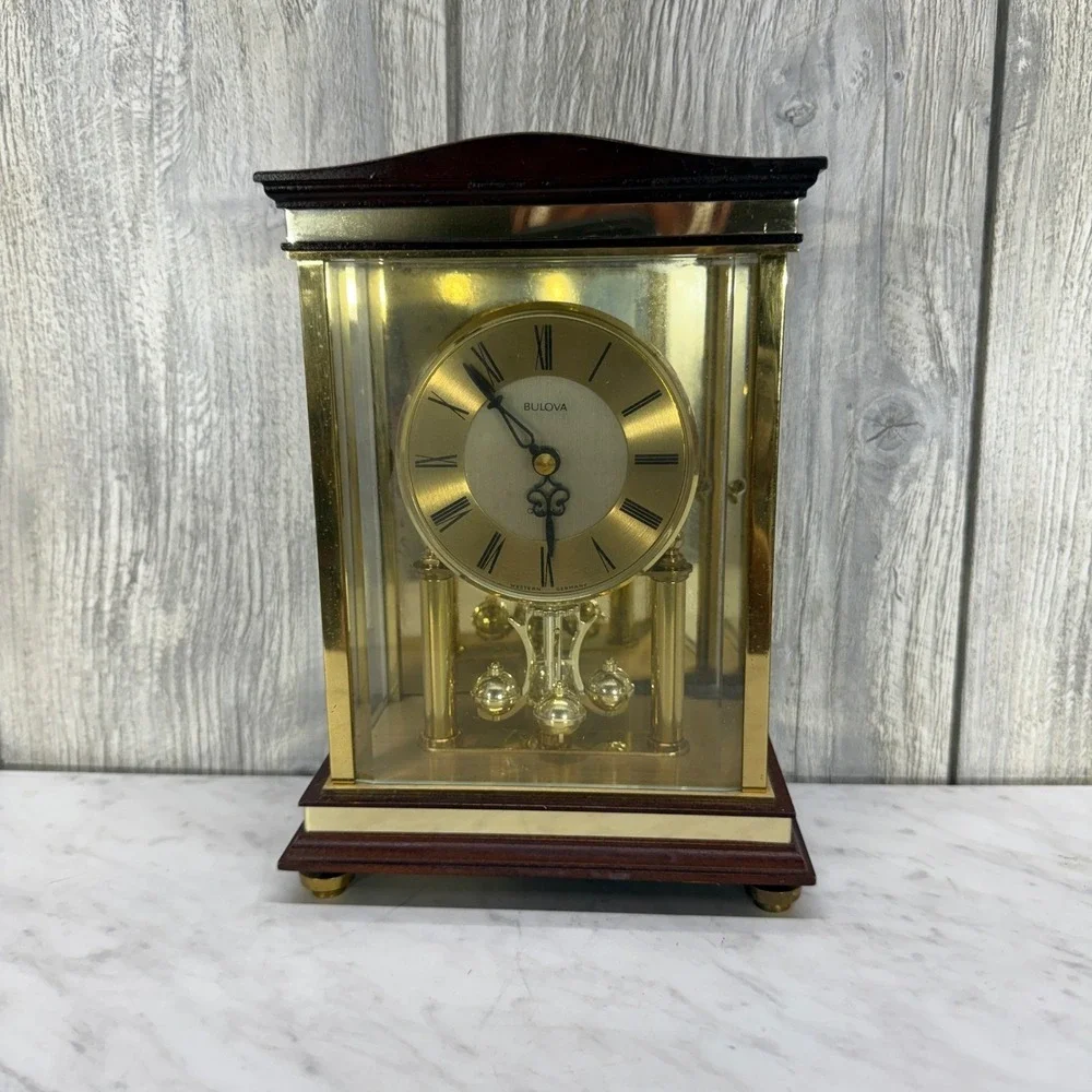 Bulova Anniversary Clock Quartz West Germany Brass Glass Wood Rotating Pendulum